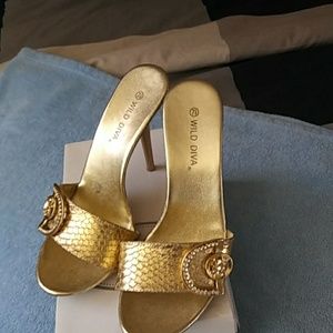 Pair of Gold Heels - size 7 1/2.